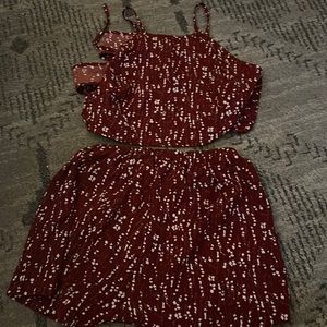A 2 peice top is a crop top that ties and has matching high waisted shorts